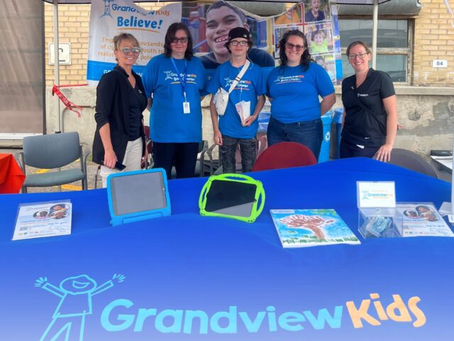 Image of staff and volunteers at the GM Appreciation event in support of Grandview Kids.